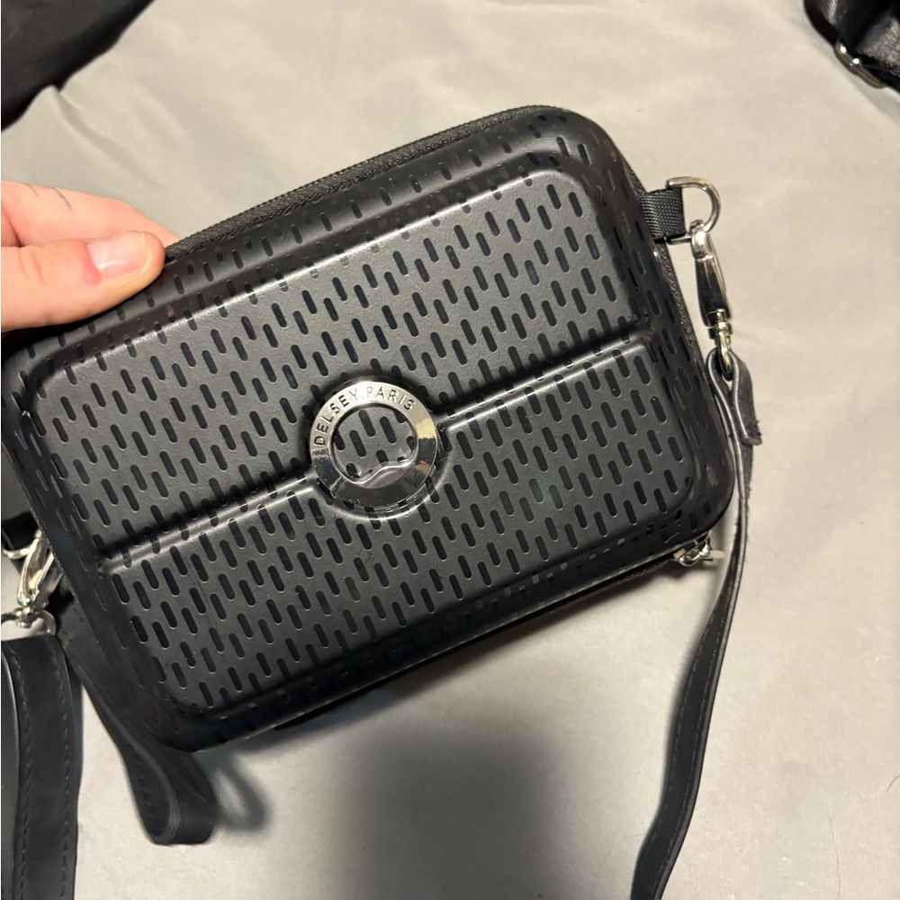Delsey Paris Black Perforated Crossbody Bag